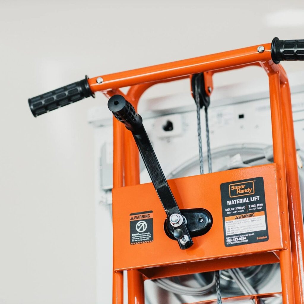 Close up of the SuperHandy GUO097 hand crank winch handle rubber grips and 330 lb capacity rating label