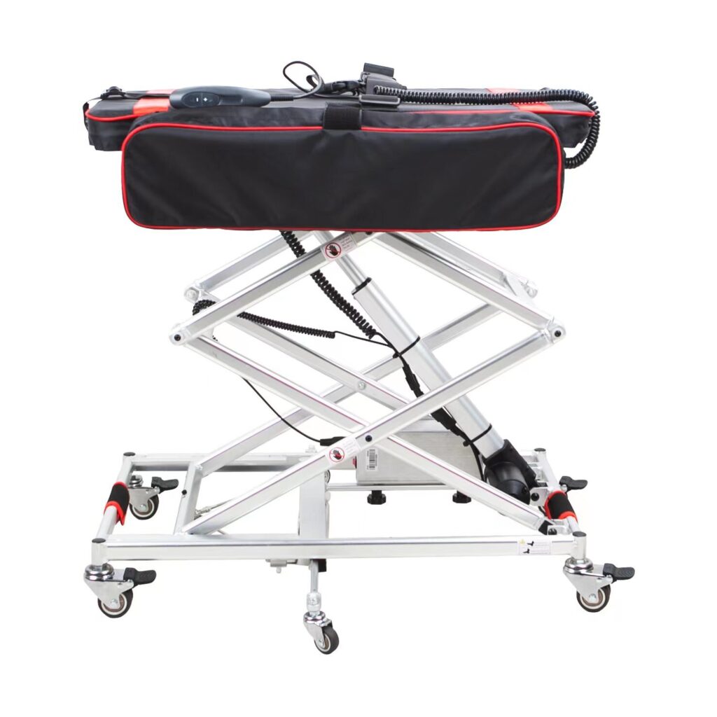 Porto Mobility Rovan lift raised on its scissor frame with a black carry bag on the platform